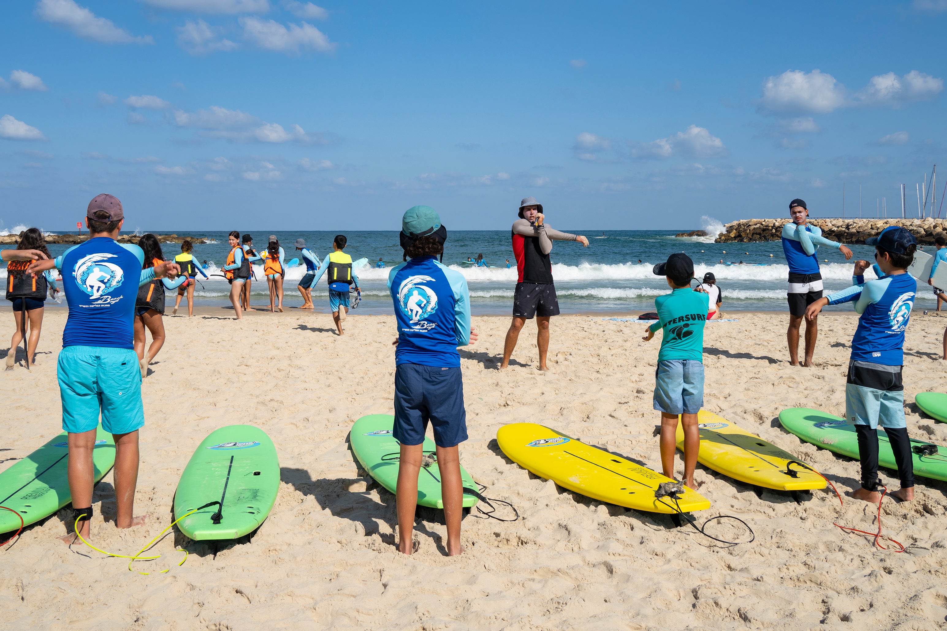 Kids surfing in Israel